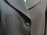 a close up of a suit on a mannequin mannequin mannequin mannequin mannequin mannequin mannequin mann