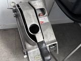 an image of a machine that is plugged into a wall