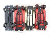 four red and black skateboards lined up on top of each other