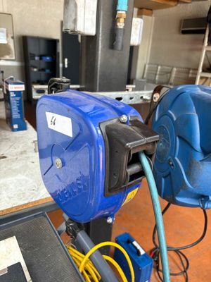 a blue machine that is sitting on a table