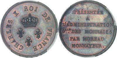 a close up of a coin with a crown on it