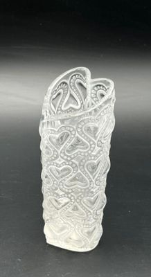 an image of a glass vase on a table