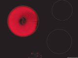une plaque de cuisson noire et rouge équipée de trois feux