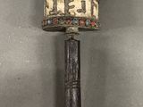 an image of a hammer with a decorative design on it