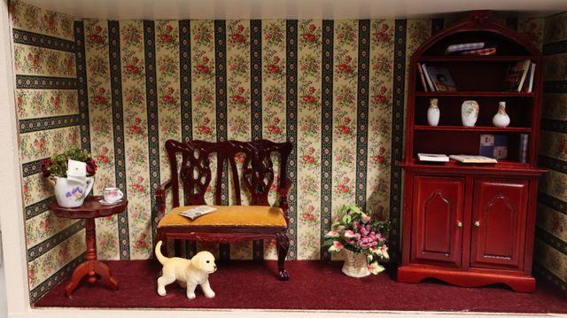 Diorama. Composition miniature, dans une vitrine en bois, vitre e...