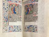 an open book with a picture of a man and a woman on it