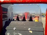 a red fire hydrant that is in the back of a truck