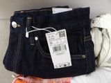 a pile of clothes with a price tag on it