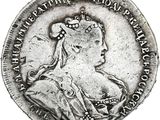 une pièce d'argent portant une tête de femme et une couronne