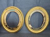 paire de cadres de miroir ovales anciens dorés, aux bords biseautés