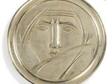 an image of a close up of a medal on a white background