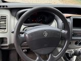 dashboard of a car with a steering wheel and dashboard controls