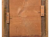 an old wooden picture frame with a piece of paper taped to it