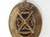 une image représentant une médaille de bronze sur laquelle figure l'emblème des pompiers