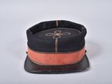 a black hat with a pink ribbon on it