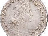 une pièce d'argent portant une tête de femme et une couronne