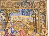 a picture of a tapestry with a picture of a man and a woman