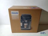 the box of the coffee machine is open and ready to be used
