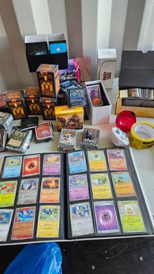 a table with a lot of cards and other items on it