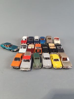a lot of toy cars that are sitting on a table