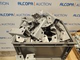 a large metal container filled with metal parts sitting on top of a pallet