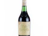 a bottle of wine that is sitting on a table