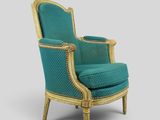 an image of a blue chair with gold trim and a green upholstered seat