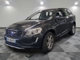 vue de face d'un SUV Volvo de couleur sombre garé dans un garage