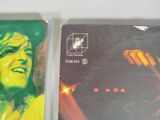two cassettes that are sitting next to each other