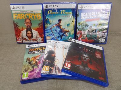 a lot of video games that are on the table