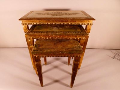 three small tables that are stacked on top of each other