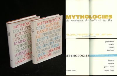 three books are stacked on top of each other on a table