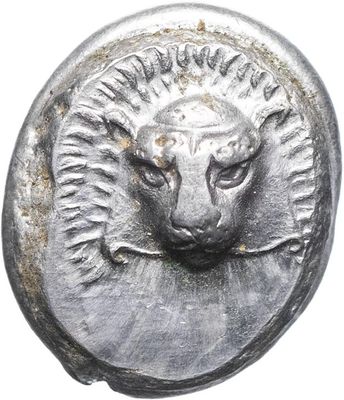 an image of a silver coin with a lion ' s head on it