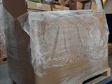 a large box sitting on a pallet in a warehouse