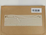 an image of a box with a pair of scissors inside of it