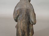 an image of a statue of a person with a hood on
