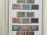 an open book with a picture of a group of stamps on it