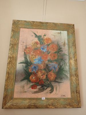une photo d'un tableau accroché au mur