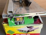a box that has a laptop on top of it