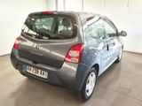 a grey car that is parked in a garage
