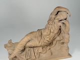 marble statue of a woman reclining on a reclining platform