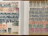 a book with stamps on it sitting on a table