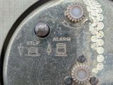 a close up of a metal object with a heart on it