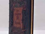 an old book with a picture of a bird on it