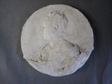 a picture of a plaster bust of a woman