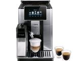 une image d'une machine à café avec deux tasses de café