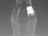 a glass vase that is sitting on a table