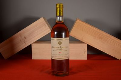 a bottle of wine that is sitting on a table
