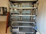 many shelves in the kitchen that have food on them