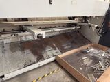 a machine that is working on a piece of metal